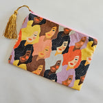 Assorted printed zip clutch