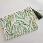 Assorted printed zip clutch