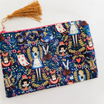 Assorted printed zip clutch