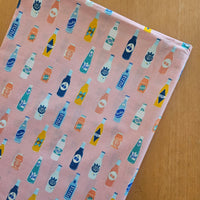 Pink soda bottles top